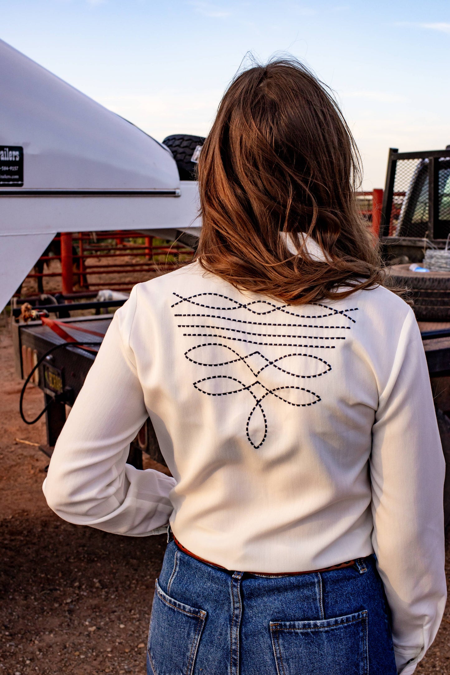 Boot stitch embroidered white top